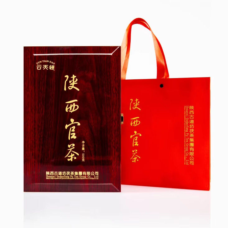 Le thé noir chaud de Shaanxi Le thé aux fleurs d'or Une boîte-cadeau exquise pour un cadeau traditionnel et sain